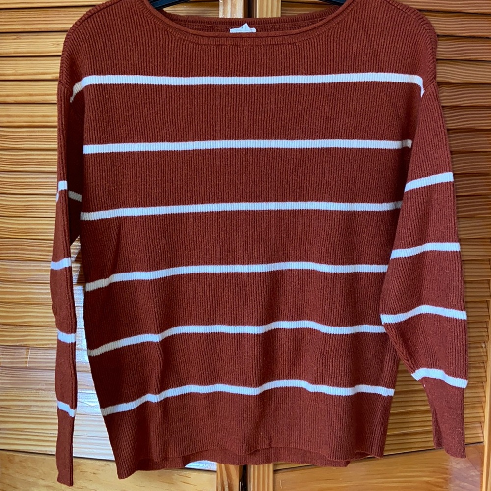 brown and white stripped sweater garage
